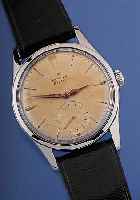 ZENITH Herrenarmbanduhr Modell Pilot, Ref.- Nr. 9345606, Schweiz um 1958, Edelstahlb. ge- schr., Blatt altersbed. farbl. get., Lederbandspäter, ...