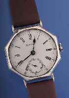 MOVADO Herrenarmbanduhr, Ref.-Nr. 406, Schweiz um 1922, Sterling-Silber, Achteckform,Boden u. Glasr. gedr., Emailbl. repar. u. m. transp. ...