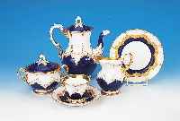 Kaffeeservice, Meissen, um 1870-80, 1. Wahl, Porzellan, partiell kobaltblau glasiert, reich in Rocaillen reliefiert und vergoldet, bestehend ...