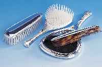 Bürste- und Handspiegel-Set, deutsch um 1930, Art-Deco, best. aus Kleider- und HaarbürsteSpiegel und Kamm, 835er Silber, Lutz und WeissPforzheim, ...