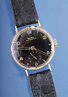 DOXA Herrenarmbanduhr Modell Antimagnetique, Ref.-Nr. 11112, Schweiz/Frankreich um 1940, GG 750/000-Rundgeh., D. 32 mm, Boden u. Glas- rand gedr., ...