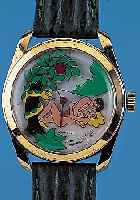 ADAM AND EVE Comicuhr mit beweglicher ero- tischer Szene, Aluminiumgeh., elox., Boden gedr., schweizer Stiftenankerwerk, um 1975, Lederband, ...