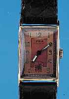 ROAMER Herrenarmbanduhr Modell Standard, Schweiz um 1938, Metall nachverg., Edelst.- Boden gedr., zweifarb. teilw. verkupfertes Orig.-Blatt, ...