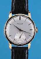 TISSOT Herrenarmbanduhr, Ref.-Nr. 4028205, Schweiz um 1946, GG 750/000, Boden gedr., Bl. rest., kl. Sek. vert., Nickelankerwerk Kal. 27-1, 15 ...