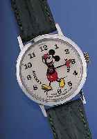 COMICUHR Modell Mickey Mouse, Ref.-Nr. 23, Schweiz um 1968, Metallgeh. verchr., Pappzif- ferbl., Walt-Disney Produkt., schweizer Stif- tenankerwerk ...