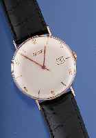 TISSOT Herrenarmbanduhr, Ref.-Nr. R76004-1, Schweiz um 1949, RG 750/000, D. ca. 36 mm, Zentralsek., Datum, Boden u. Glasr. gedr., 17 St., ...