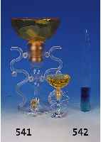 Drei Factisenflakons, Ohlala von Loris Azzaro, farbloser und bernsteinfarbener Kunststoff,die beiden kleineren Glas in Kunststoffhal- terungen, H. ...