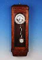 Wanduhr, Gustav Becker, um 1920, Eichenge- h„use in zeittyp. Stil, zweigeteiltes Email- zifferblatt, skel. Messingplatinenwerk, Haken-gang, ...