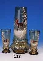 Kanne mit sechs Gl„sern, deutsch, um 1890, grnes Glas mit Emailmalerei, Winterlandschaf-ten mit Hirsch bzw. Rehen, H. ca. 32,5 bzw. 16,5 cm