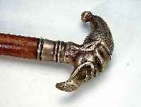 Spazierstock, sog. Casse-Tete, Frankreich, um 1900, schwerer Metallgriff in Form eines Kopfes, Schuss erneuert, L. ca. 95 cm
