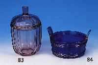 Deckelgefäß, Wiener Werkstätte, Entwurf Josef Hoffmann, amethystfarbenes Glas, facettiert, monogrammiert, min. best., H. 19.5 cm