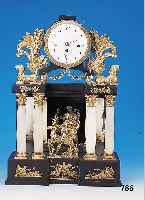 Empire-Uhr, wohl Wien, um 1820/30, Holzge- häuse, dunkel gebeizt, reich verziert mit ver-goldeten Appliken in Form von musizierenden Putti, Frau ...