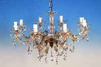 Deckenleuchter, 50er Jahre, glasummantelte Metallmonturen, facett. Glasbehang, 8 Brenn- stellen, Elektr. nicht geprft, H. ca. 37 cm, D. ca. 60 cm