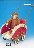 PUPPENKINDERWAGEN, DEUTSCH UM 1950/53, MIT MOHAIRAFFE 50ER JAHRE, HOLZ BUNT STAFFIERT, KUNSTSTOFFBESATZ U. CREMEFARBENEM GEFLECHT, GRIFF ...