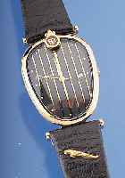 GIRADELLI Designerherrenarmbanduhr, Jaguar, Schweiz um 1997, Metall hartverg., Edelst.- Boden aufgedr., bomb. Mineralglas, Form eines Autokühlers ...