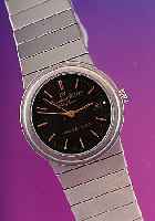 IWC Damenarmbanduhr, Modell Porsche Design, Titan, Datum, Zentralsek., Quartzwerk, Titanband, Schweiz ca. 1988, D. ca. 26 mm, EZW 1 EZG 2, ...