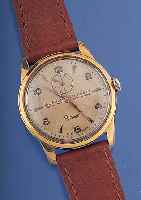 BUREN Herrenarmbanduhr Modell Grandprix, Ref.-Nr. 681801, Schweiz um 1955, Messing ver-g., Edelst.-Boden geschr., Orig.-Blatt, m. ...