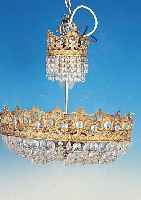 Deckenleuchter, deutsch, um 1930, verzierterBronzeguß, oben in Form einer Krone, reicher facett. Glasbehang, 6 Brennstellen über 2 ...