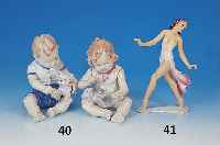 Zwei Porzellanfiguren, Gräfental, 20. Jh., zwei sitzende Kinder, bunt staffiert, H. je 18 cm