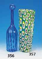 Vase, Murano, 20. Jh., türkisfarbenes Glas mit eingeschmolzenen Blüm-chen in Rot, Gelb u. Blau, H. ca. 33 cm
