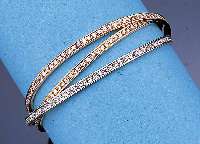 3 TEIL. ARMREIF M. BRILLANTEN, GG/WG/RG 750/000, CA. 264 BRILLANTEN ZUS. CA. 7.92 CT FEINES WEIß/VVS-VS, TOTAL CA. 54.2 G