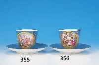 TASSE MIT UNTERTASSE, FRANKREICH, PARIS, UM 1850-60, PORZELLAN, BLAU GLASIERT, IN GOLD- GERAHMTER KARTUSCHE DER TASSE FEINE BUNTE MA- LEREI EINER ...