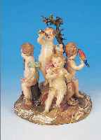 PORZELLANFIGURENGRUPPE, MEISSEN, UM 1860, FüNF PUTTEN MIT BLUMEN, OBST, STAB, FERNROHR UND PAPAGEI, BUNT BEMALT, GOLDSTAFFAGE, TEIL- ...