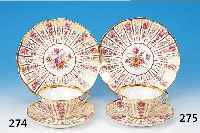 TASSE, UNTERTASSE UND KUCHENTELLER, DRESDEN, LAMM, UM 1910, PORZELLAN, FELDERBEMALUNG MITBUNTEN BLüTENGIRLANDEN UND GOLDENEN ROCAILLEN,H. TASSE ...