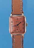 WITBA Herrenarmbanduhr Modell Shockresist, Schweiz um 1940, RG 750/000, Carree-Arronde- Form, tropfenförm. Bandanst., Boden gedr., kupferfarb. ...