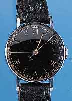 ETERNA Herrenarmbanduhr, Ref.-Nr. 2795374, Schweiz um 1944, Edelst., Rundgeh., Boden u. Glasrand gedr., D. ca. 35 mm, alles Orig., am Lederband ...