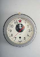 SLAVA SCHIFFSWANDUHR MODELL KOMANDIRSKIJE, RUßLAND UM 1992, 8-TAGEWERK M. AUFGES. ECHAP- PEMENT, MALTESERSTELLUNG, WANDPLATTE D. CA. 21 CM, L. ...