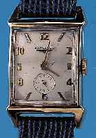 LONGINES Herrenarmbanduhr, GG-filled, Rectang.-Form, Bod. aufgedr., 2-fläch. Konkavgl., Orig.-Blatt vers., zum Rand zu l. ...