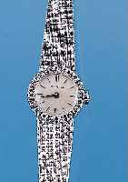 LONGINES Damenarmbanduhr, neutr. WG 750/000-Geh. incl. WG-Band, Lünette m. 8/8 Diamanten zus. ca. 0,54 ct feines Weiß, Boden gedr., vers. ...