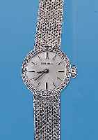LONGINES Damenarmbanduhr, neutr. WG 750/000-Geh. rhod., Lünette m. 8/8 Diamanten zus. ca. 0,32 ct l. get. Weiß, Boden gedr., vers. ...