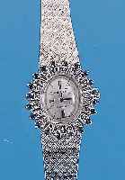 ZENITH DAMENGOLDBANDUHR, NEUTR. WG 750/000- OVALGEH. INCL. WG-FLECHTBAND, LüNETTE M. 20 8/8 DIAM. ZUS. CA. 0,3 CT FEINES WEIß U. 20 SAPHIREN, ...