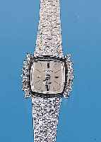 ZENITH DAMENGOLDBANDUHR, NEUTR. WG 750/000- GEH. INCL. WG-BAND RHOD., LüNETTE SEITL. M. 14 8/8 DIAMANTEN ZUS. CA. 0,21 CT FEINES WEIß,BODEN ...