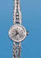 ROX Damengoldbanduhr, GG 750/000-Geh. rhod. incl. Gliederband, zu den Bandanst. je 3 8/8 Diamanten zus. ca. 0,2 ct l. get. Weiß, Boden gedr., ...