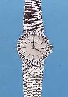 LONGINES DAMENGOLDBANDUHR, NEUTR. WG 750/000-GEH. INCL. WG-FLECHTBAND, LüNETTE AUFW. M. 18 8/8 DIAMANTEN ZUS. CA. 0,54 CT FEINES WEIß,BLATT MATT ...