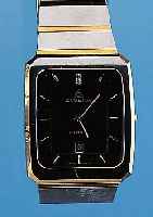 DUGENA HERRENARMBANDUHR CANDINO, REF.-NR. 81210081, SCHWEIZ UM 1996, METALL HARTVERCHR.,TEILW. VERG., METALLBAND M. DOPPELTER UNSICHT-BARER ...