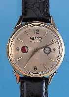 LE COULTRE Herrenarmbanduhr Futurmatic, Schweiz/USA um 1956, GG-Filled, Boden gedr., sogen. Hammerautomatik m. Gangreserveanz., d. Fenster ...