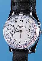 MINERVA Armbandchronograph, Schweiz um 1932,Metall nachverchr., Edelst.-Boden u. Glasrand gedr., Lederband später, Emailbl. rep. bei 1, gebl. ...