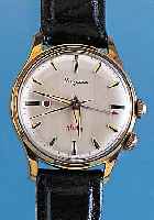 DUGENA Armbandwecker Modell Alarm, Schweiz um 1960, Metall verg., ber., Edelst.-Boden geschr., vers. Blatt, Weckbereitschaftsanz. durch ...
