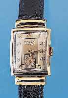 GRUEN Herrenarmbanduhr Curvex, Ref.-Nr. G422356, USA/Schweiz um 1949, GG-filled, Car- reeform m. verd. Bandanst., Boden gedr., in sich extrem ...
