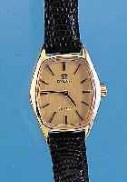OMEGA DAMENARMBANDUHR MODELL DE VILLE, REF.-NR. 511291, SCHWEIZ UM 1974, GG 750/000, NEU- TR. LEDERBAND, ORIG.-ETUI, BODEN GEDR., RUND- ANKERWERK, ...
