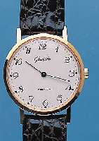 GLASHÜTTE HERRENARMBANDUHR, METALL HARTVERG.DEUTSCHLAND UM 1980, EDELST. GEDR., EMAILFARB.KONTRASTZIFFERBL., DAMENANKERFORMWERK, KAL. 09/20, 17 ...