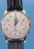 I.T.A. ARMBAND-CHRONOGRAPH, SCHWEIZ UM 1949,750/000 RG, BOD. U. GLASR. AUFGEDR., METALLCUV. ZUR ARMIERUNG, VERS. BLATT, 30 MIN.-STOPPZ.,TELE- U. ...