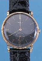 LONGINES HERRENARMBANDUHR, SCHWEIZ UM 1943, 585/000 GG, BOD. U. GLASR. AUFGEDR., AUßER LEDERBD. ORIG.-ZUSTAND,BLATT ...
