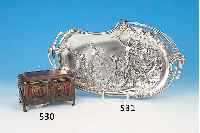 DECKELKäSTCHEN, EHRHARDT & SöHNE SCHWäBISCH- GMüND, UM 1900, WURZELNUß MIT BRONZEAPPLIKA-TIONEN, ORIG. SCHLüSSEL, SIGN., CA. 9 X 16 X 9CM, ...