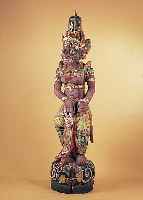 GERUSHA, BALI, 60ER JAHRE, HOLZ GESCHNITZT, REICH BUNT BEMALT UND MIT GOLDSTAFFAGE, SPANNUNGSRIß, H. CA. 212 CM