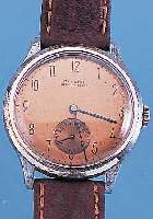 KONVOLUT: 2 HERRENARMBANDUHREN, 40ER JAHRE, 1X SMITHS, ENGLAND, 15 ST., HANDAUFZUG, KAL. C332/34, MATT VERG., SCHR.-UNR., FLACHSPIR., OHNE ...